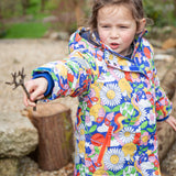 A child wearing the Frugi Children's Snow & Ski Coat - Retro Happy