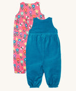 Frugi kids reversible helen dungarees in boat blue/fun flowers. A 100% GOTS organic cotton dungaree with a blue corduroy a pink reversible side with playful flower prints and handy back pocket. Features popper fasteners on the shoulder straps and cuffed  ankles.