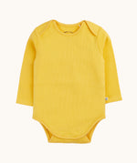 The yellow coloured long sleeved vest from the Frugi ribbed material 2 pack long sleeved body vests. 