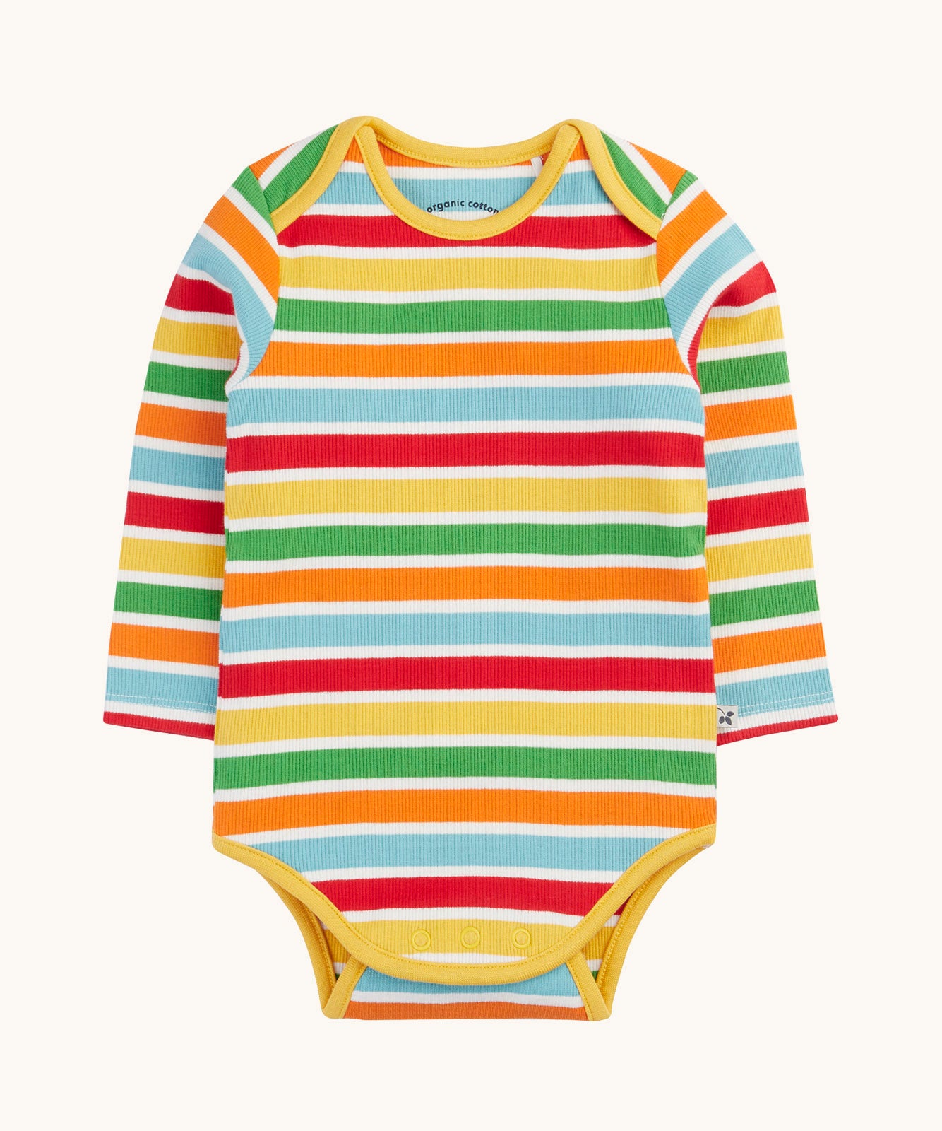 The rainbow striped vest from the Frugi ribbed material 2 pack long sleeved body vests. Rainbow stripes, bands of red, pastel yellow, green, orange and pastel blue in between thinner white stripes. 
