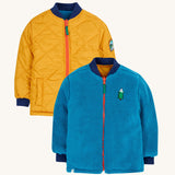 The Frugi Robin Reverse Quilted Fleece Jacket - two of the jackets are shown to display both sides of the reversible kids' coat, one is golden quilted and another is blue fleece.