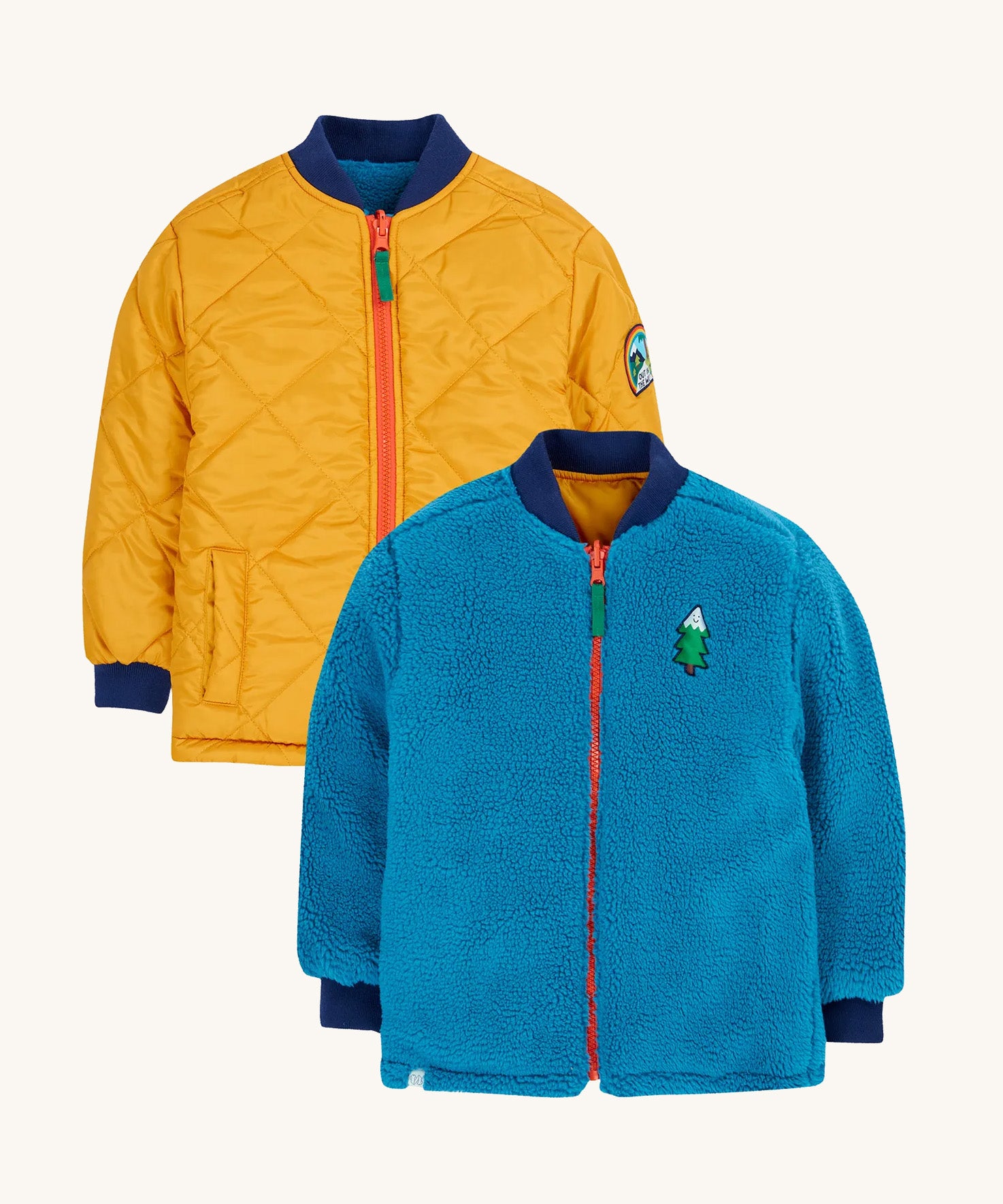 The Frugi Robin Reverse Quilted Fleece Jacket - two of the jackets are shown to display both sides of the reversible kids' coat, one is golden quilted and another is blue fleece.