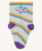 The bicycle design organic cotton kids socks from the Frugi rock my socks adventure socks multipack. The design features a navy blue bicycle with a multi-coloured stripe on a grey marl background.