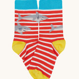 Frugi Rock My Socks laid flat, in the High Seas print. Featuring the bright striped pair with sharks.