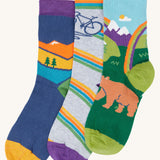 Frugi rock my socks adventure 3 pack organic cotton kids socks. The socks all have adventure themed designs, mountains, bikes and bears.