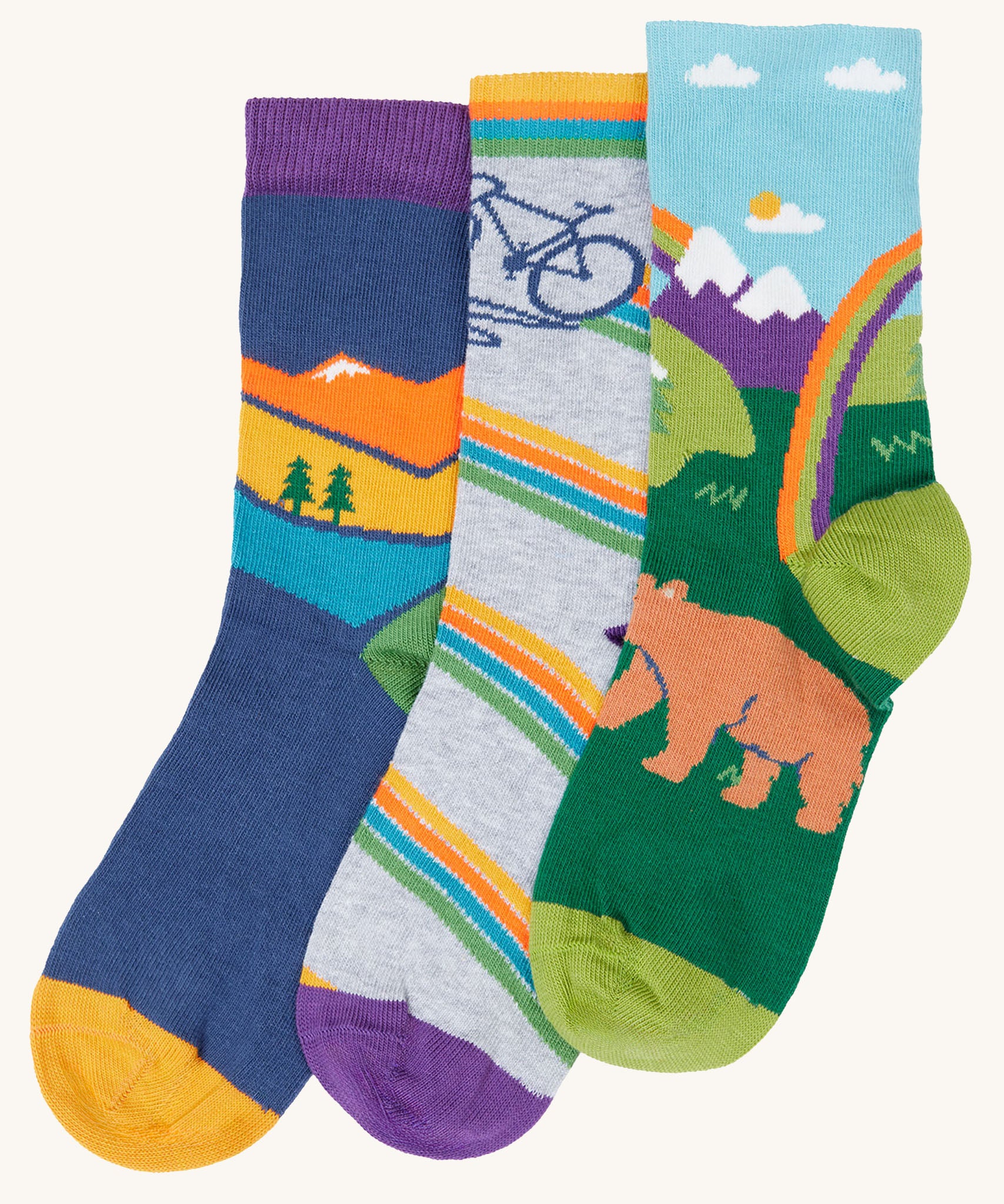 Frugi rock my socks adventure 3 pack organic cotton kids socks. The socks all have adventure themed designs, mountains, bikes and bears.