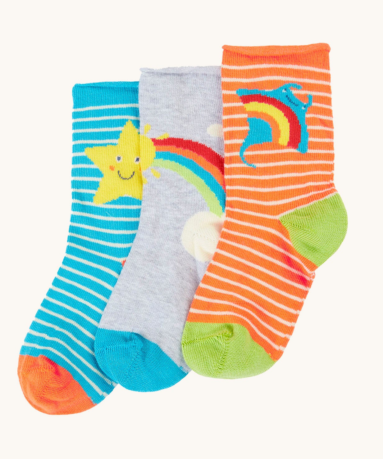 Frugi pack of three bamboo children's socks with roll tops. One blue striped pair with a yellow star, one plain grey with a rainbow and sun and one orange striped pair with a ray. 