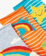 A close up of the orange striped ray socks from the Frugi pack of three bamboo children's socks with roll tops. 