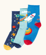 Frugi roly roll top bamboo socks 3 pack with space adventure designs. One navy pair with stars and planets one green striped with earth pair and one blue with a rocket.