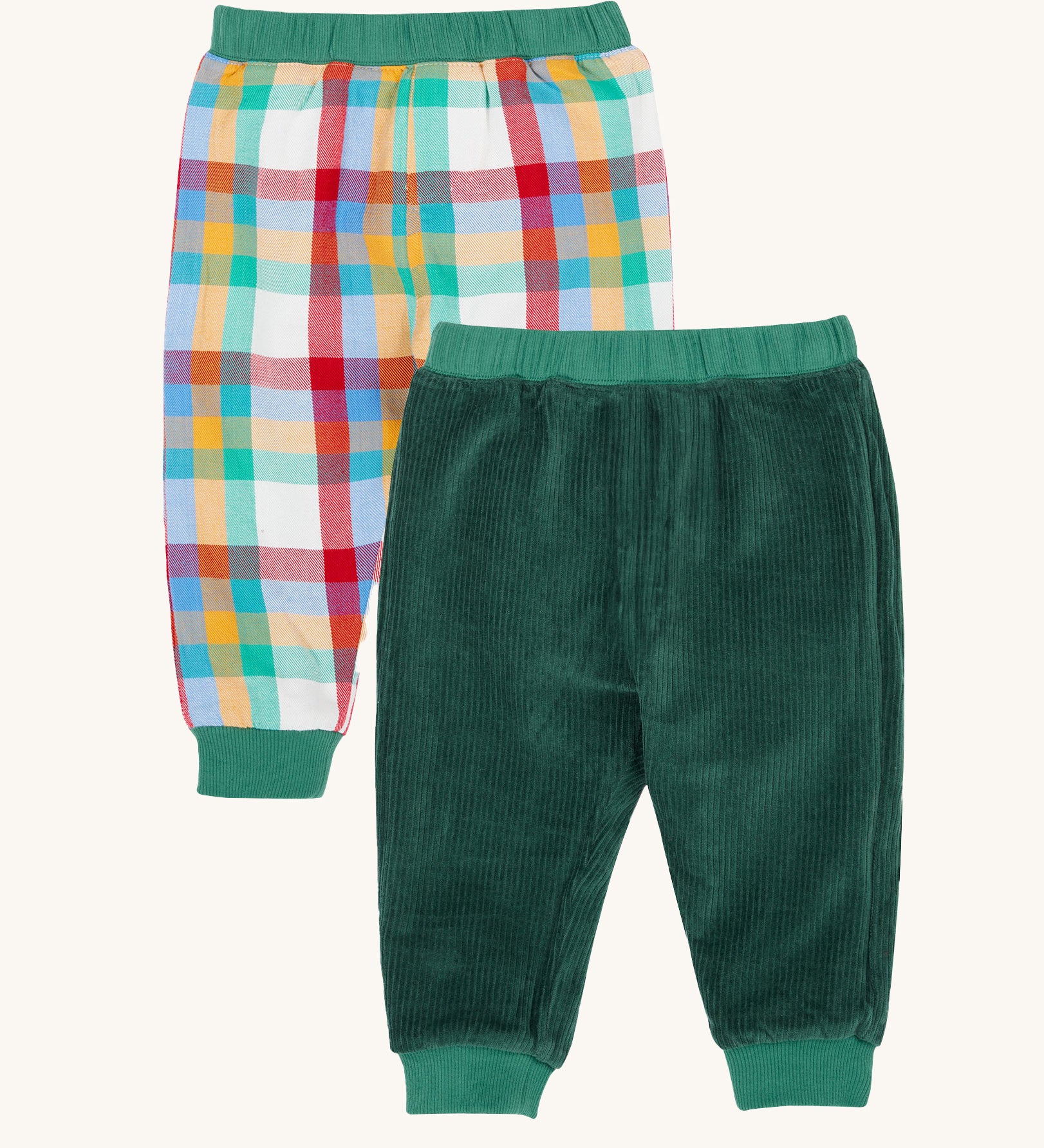 Frugi Ronnie Holly Green Check Reversible Pull-Up Trousers. One side has a rainbow coloured check and the other side has a holly green corduroy. These trousers are part of a wide range of organic cotton clothing for children available here at Babipur.