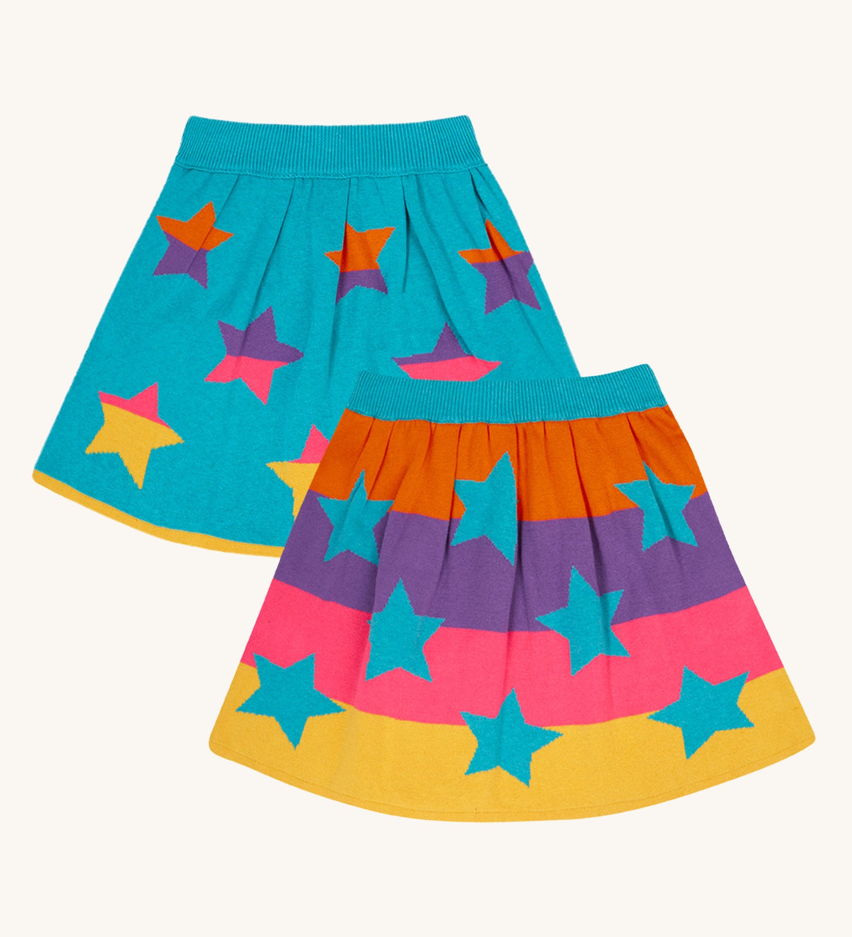 Frugi Rory Reversible organic cotton kids Skirt with a Rainbow Stars design.