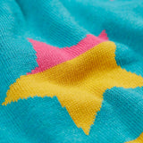 A close up of the multi-coloured striped star on the Frugi Rory Reversible organic cotton kids Skirt with a Rainbow Stars design.
