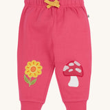 Frugi rose pink coloured flower and mushroom crawlers organic cotton kids joggers.