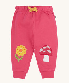 Frugi rose pink coloured flower and mushroom crawlers organic cotton kids joggers.