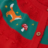 Close up of the embroidered fox and toadstool on the Frugi scarlet red organic cotton ishbel embroidered fox cardigan.