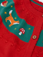 Close up of the embroidered fox and toadstool on the Frugi scarlet red organic cotton ishbel embroidered fox cardigan.