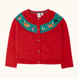 Frugi scarlet red organic cotton ishbel embroidered fox cardigan. Red knit child's cardigan with a teal band from shoulder to shoulder decorated with embroidered foxes, holly, toadstools and trees.