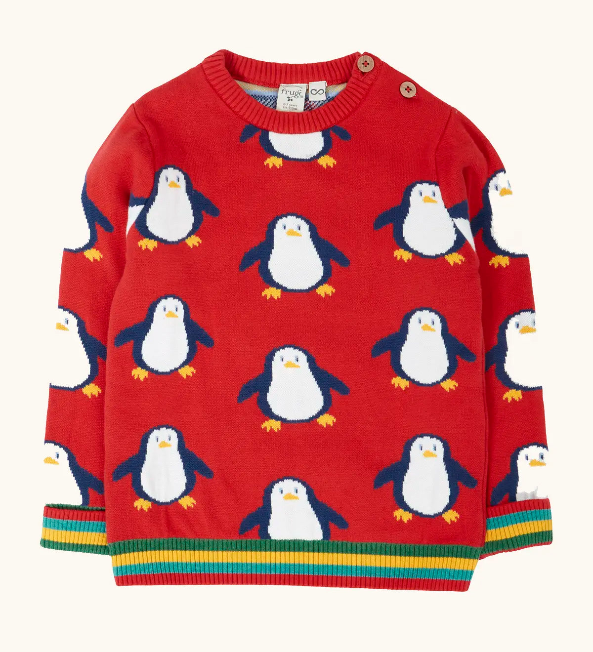 Frugi scarlet penguins organic cotton jolly knitted jumper. Red knitted jumper with repeat penguin print and rainbow stripe hemline and arm cuffs.