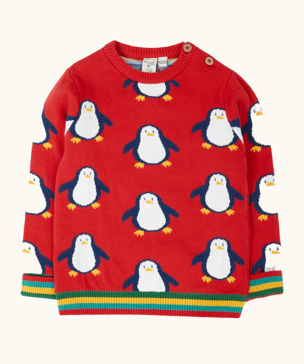 Frugi scarlet penguins organic cotton jolly knitted jumper. Red knitted jumper with repeat penguin print and rainbow stripe hemline and arm cuffs.