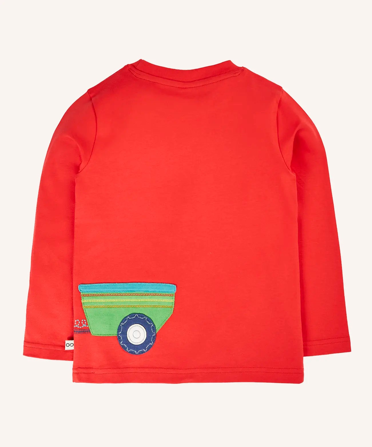 Back of the Frugi Scout circular t-shirt in a scarlet red with a green trailer applique on the back with a wrap around tractor design.