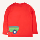 Back of the Frugi Scout circular t-shirt in a scarlet red with a green trailer applique on the back with a wrap around tractor design.