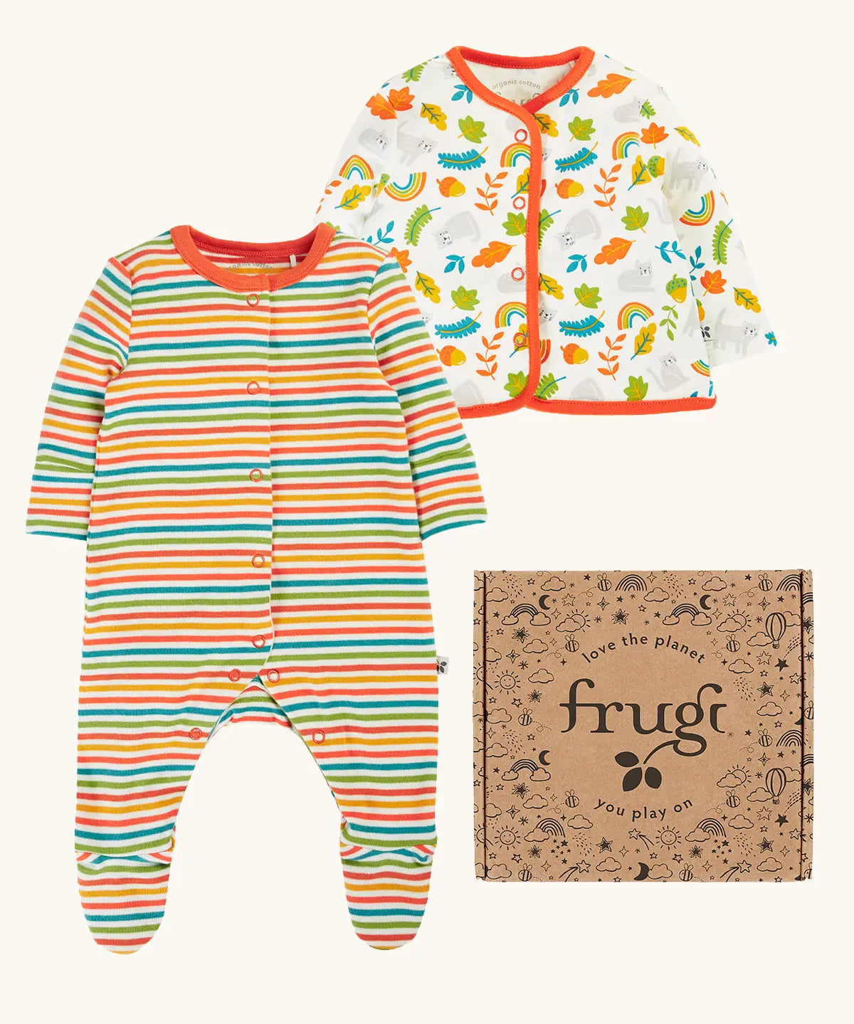 Frugi scrumptious babygrow gift set with a rainbow stripe footed sleepsuit and wild cat print cardigan presented in a cardboard gift box. 