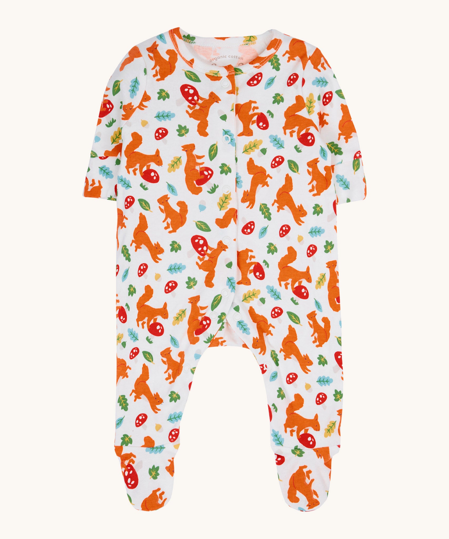Frugi white babygrow with playful squirrel prints from the scrumptious babygrow set A 100% GOTS organic white cotton all in one  with popper fasteners.
