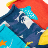 A close up of the roll tops on the Frugi pack of three sealife themed bamboo children's socks. A looser fit roll top for comfort.
