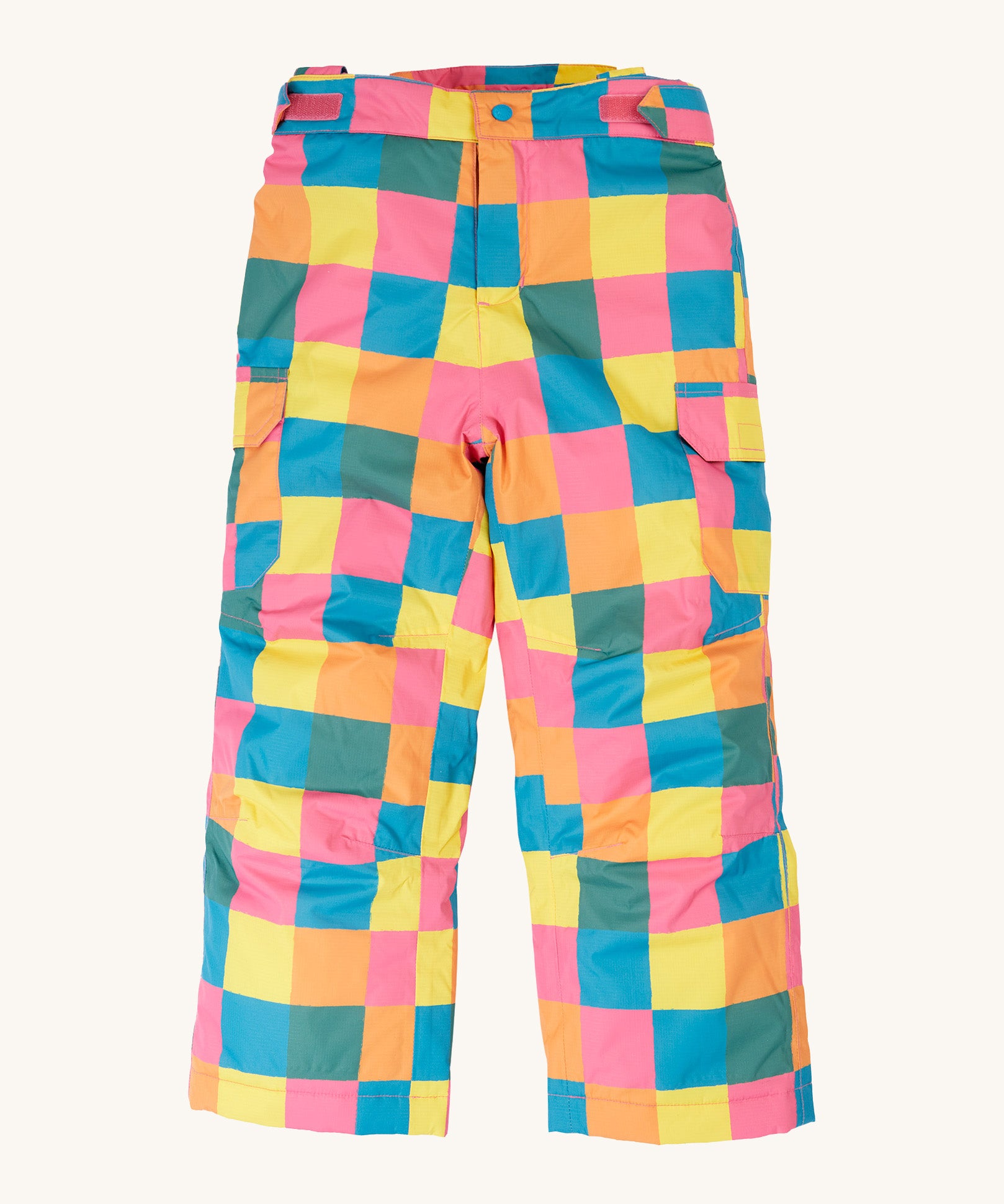 The trousers from the Frugi rainbow check snow and ski salopettes showing the adjustable waistband and combat style side pockets