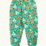 Frugi organic cotton kids snuggle joggers in green with an all over wildflower wander themed print.