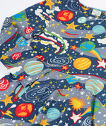 Close up of the Frugi Sofia organic cotton skater dress in navy with an all over explore the stars print. 