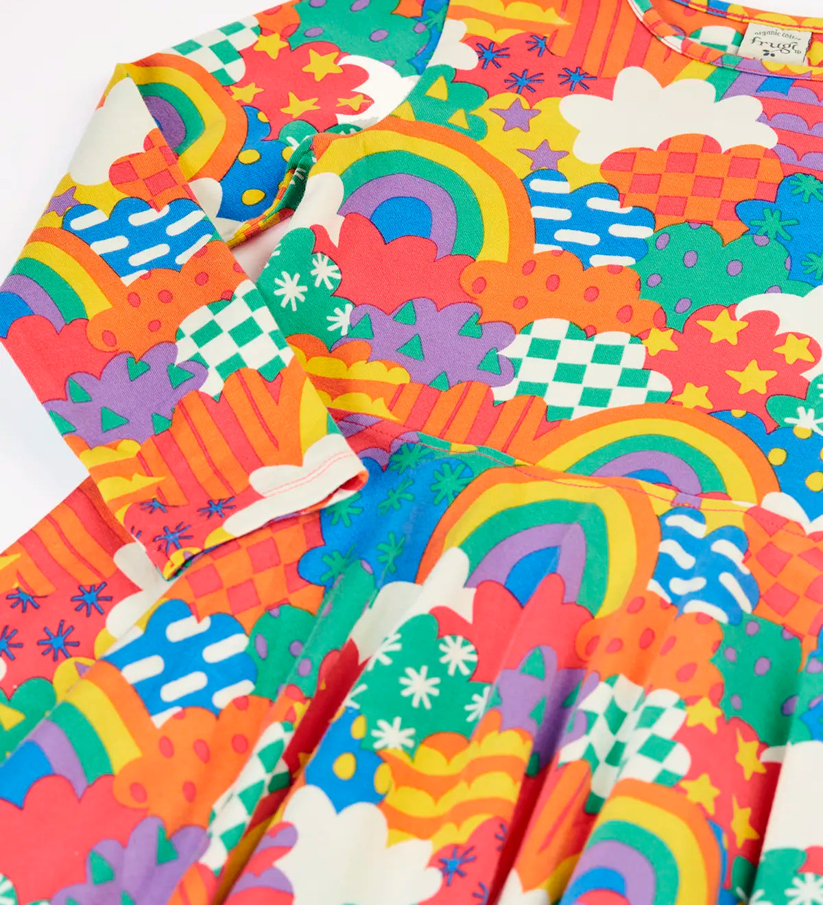 Close up of the Frugi Sofia organic cotton long sleeved skater dress in a multi-coloured fun frenzy print. 