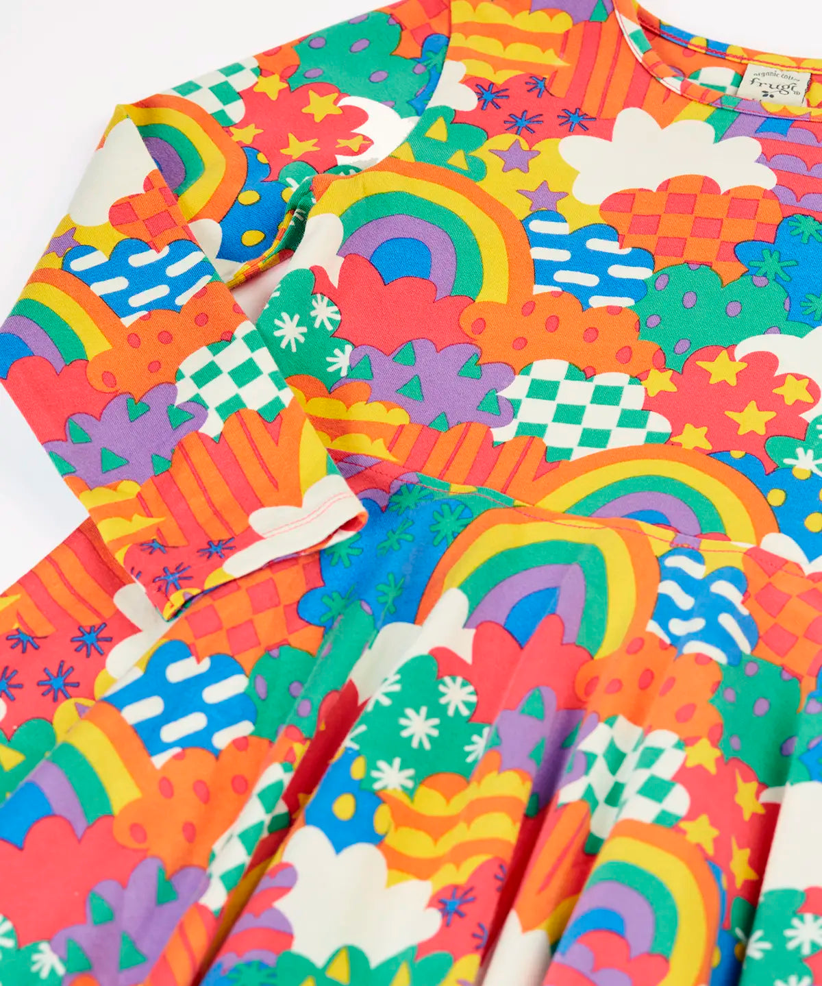 Close up of the Frugi Sofia organic cotton long sleeved skater dress in a multi-coloured fun frenzy print. 