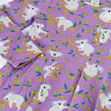 Close up of the Frugi Sofia organic cotton skater dress in purple with an all over koala cuddles print.
