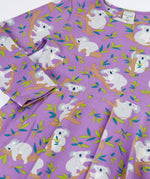 Close up of the Frugi Sofia organic cotton skater dress in purple with an all over koala cuddles print.