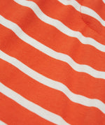 A close up of Frugi Stithian Shorts in Tiger Orange Breton.