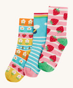 Frugi kids rock my socks strawberry bumblebee and flower design on a cream background.