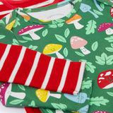 A close up view of the set of two Frugi organic cotton super special long sleeved organic cotton baby vests. The organic cotton vest has one striped vest and one fun guys design vest. 