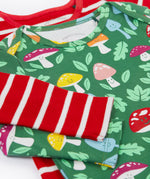 A close up view of the set of two Frugi organic cotton super special long sleeved organic cotton baby vests. The organic cotton vest has one striped vest and one fun guys design vest. 