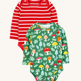 A set of two Frugi organic cotton super special long sleeved organic cotton baby vests. One of the vests feature a red and white striped design the other has an all over fun-guys mushroom themed print. 