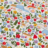 Close up of the highland field all over print on on of the vests from the Frugi super special 2 Pack long sleeved organic cotton baby body.