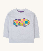 A Frugi Superb Stitched Skateboard sweatshirt. The front of the grey coloured child's jumper has an embroidered skateboard with checkerboard design.