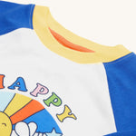 A close up of the collar on the A close up of the graphic design on the Frugi Tamar Raglan Top - White with Be Happy. 