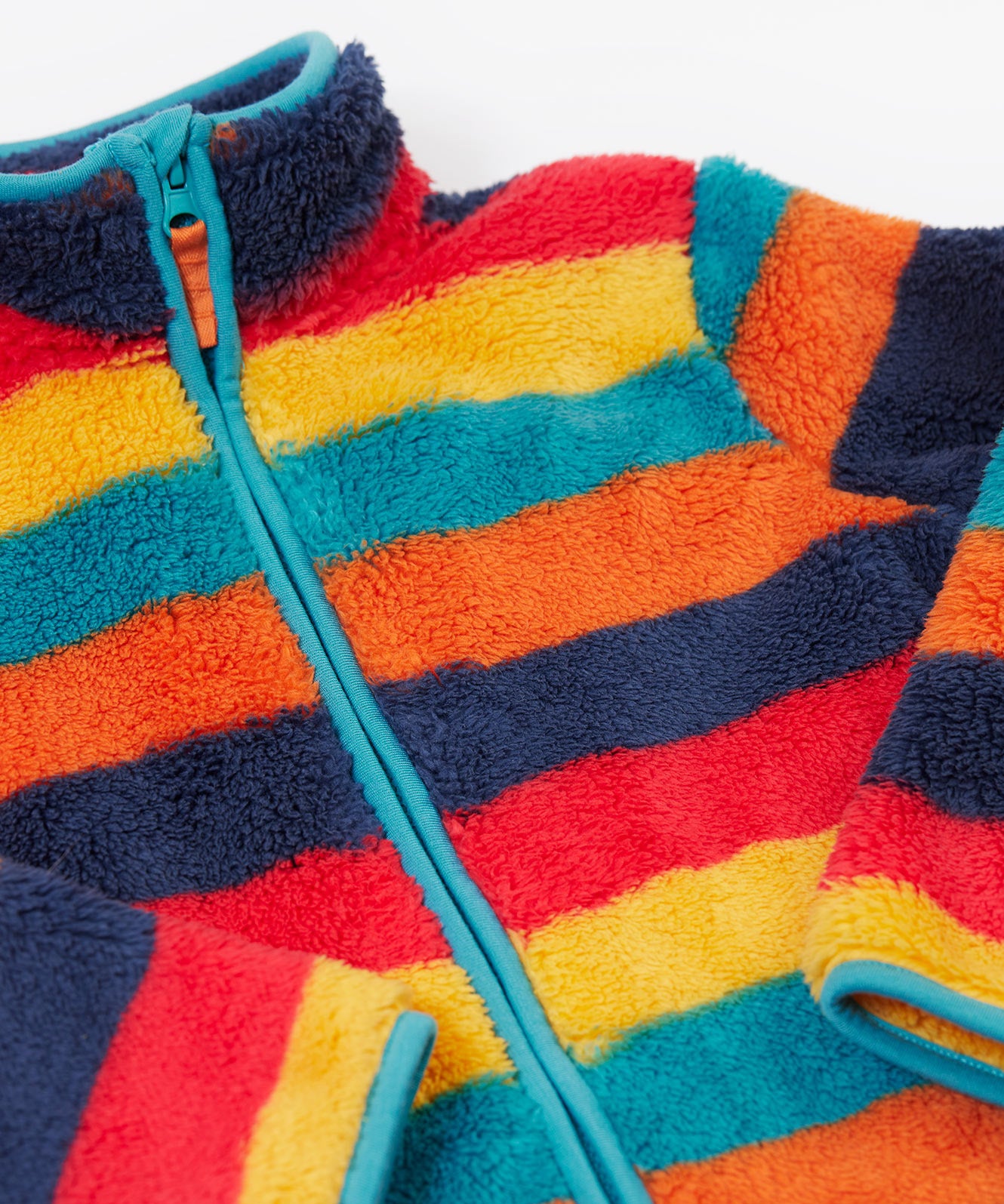 A close up of the Frugi Autumn stripe ted stripe fleece showing the light blue trim and turn up collar