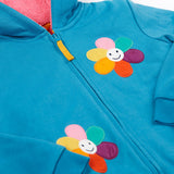 A close up of the Frugi kids ted fleece hoodie in boat blue/flowers showing the full zip detail with yellow toggle and a close up of the playful flower appliqués on bright blue 100% Oeko-Tex cotton 