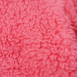 A close up of the Frugi kids ted fleece hoodie in boat blue/flowers showing the bright pink ted fleece inner detail on  100% Oeko-Tex cotton fabric