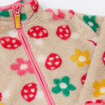 A close up of the Frugi mushroom field ted stripe fleece showing the pink trim and turn up collar