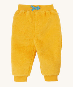 Frugi ted fleece pull ups trousers in a yellow gold colour. These cosy trousers are super soft and warm.