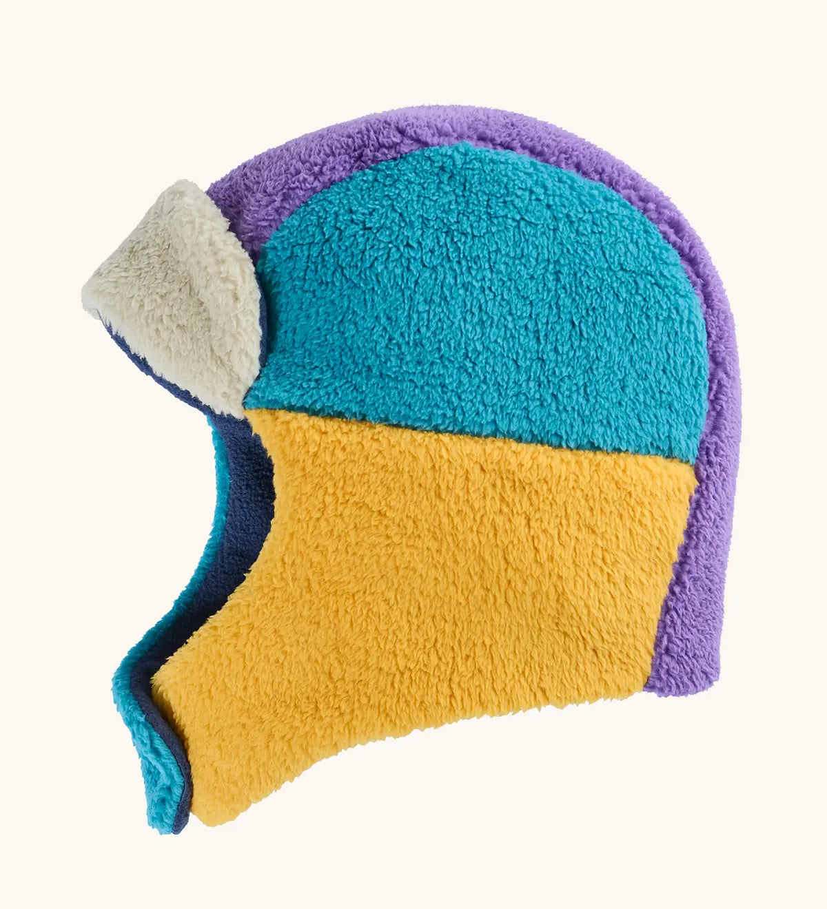 A fleece aviator-style frugi winter hat in a color-blocked pattern of teal, mustard yellow, purple, and cream.