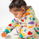 child wearing frugi onesie ted fleece